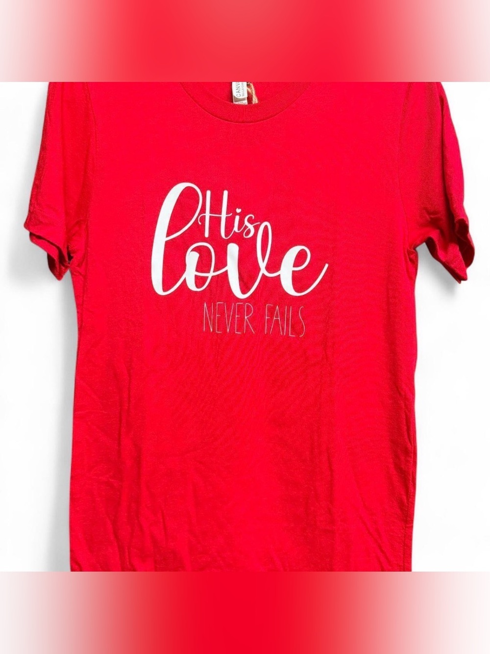 His Love Never Fails T-shirt- Canvas Sz: S